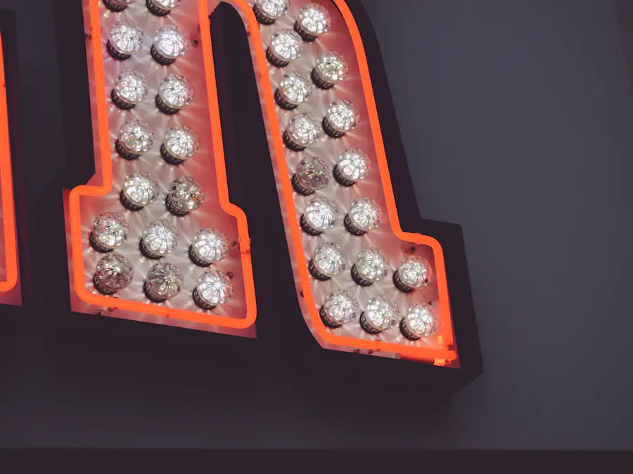 Close-up of an illuminated bulb letter on a sign